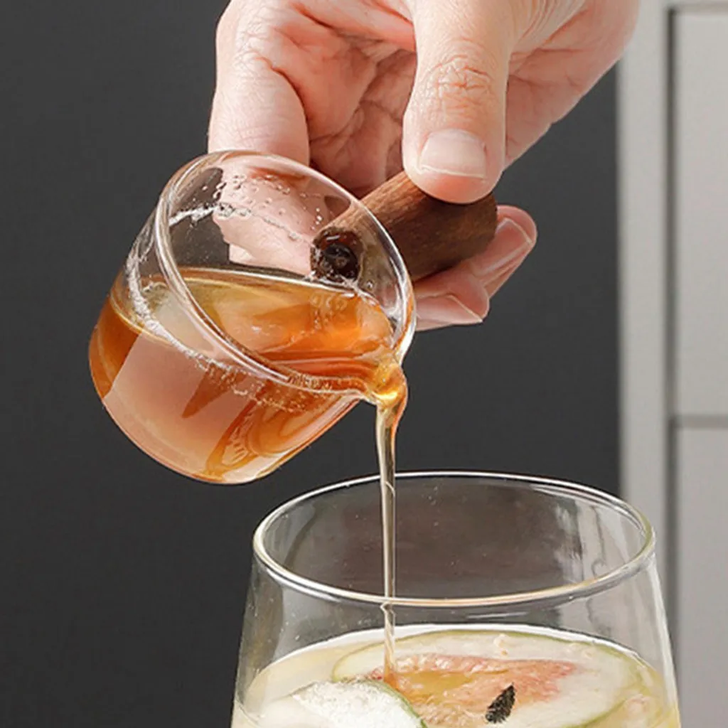 3 Stück Glas Messbecher Hitzebeständiger Holzgriff Glaswaage Tasse Milchtasse Glasmessbecher 50ml/100ml/150ml 5 3 Stück Glas Messbecher Hitzebeständiger Holzgriff Glaswaage Tasse Milchtasse Glasmessbecher 50ml/100ml/150ml – Bild 3